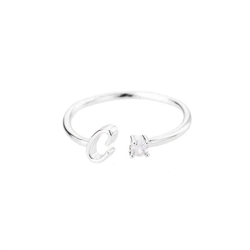 Valentia – Anillo con letra y circonita brillante