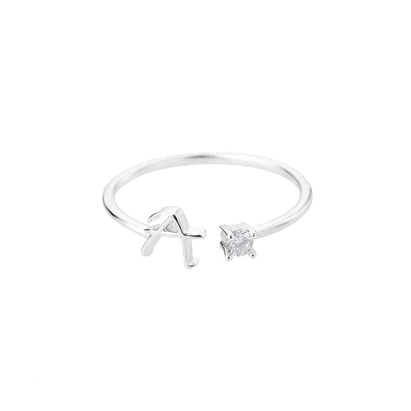 Valentia – Anillo con letra y circonita brillante